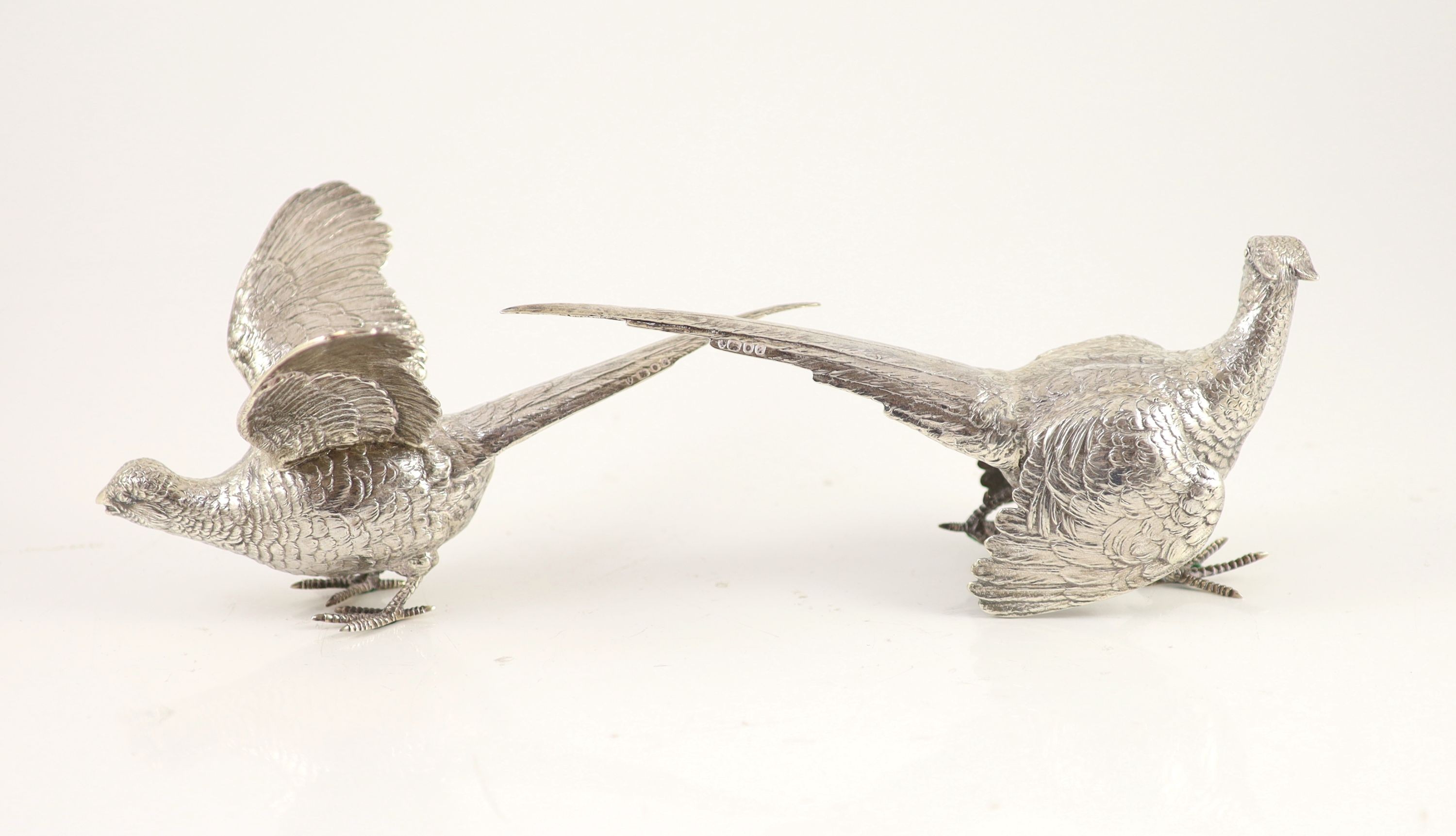 A pair of silver free standing pheasant table ornaments, by Edward Barnard & Sons Ltd,